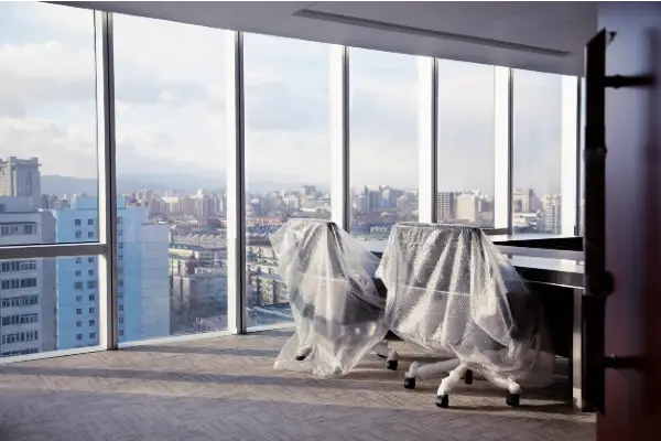 office chairs covered in bubble wrap